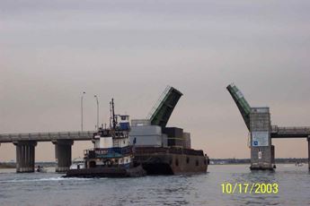 Turbine on its way to Power Plant 2 by barge